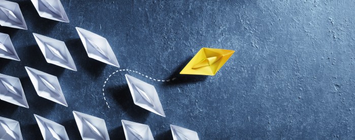 Opportunities Business Concept - Paper Boat Change Direction